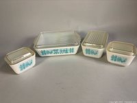All four Pyrex Amish Butterprint dishes with lids