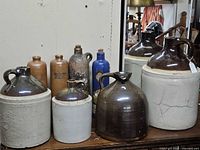 Group shot of all eight stoneware pieces on tabletop