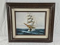Full view of framed nautical oil painting