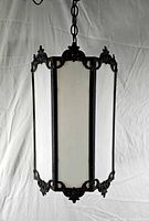 Full view of lantern unlit showing glass panels and metal frame