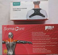 Front of both boxed items: Marnur posture corrector and SomaCare heat pack