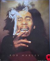 Front view showing Bob Marley image and surface condition