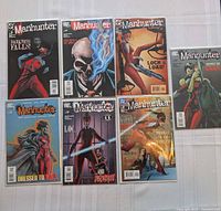 Seven Manhunter comics laid out in two rows showing all cover titles