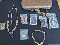 Overview of purse and all jewellery laid out