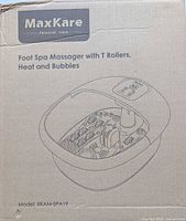 Front of box showing MaxKare Foot Spa Massager with T Rollers, Heat and Bubbles