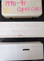Three labeled card storage boxes: 1990-91 O-Pee-Chee, 1992 Score American, 1992-93 Score