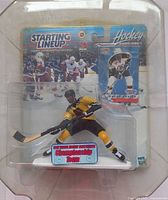 Front of sealed Starting Lineup package showing figure and card