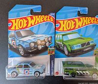 Front view of both sealed Hot Wheels cards showing models and artwork