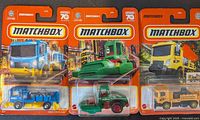 Front view of three Matchbox vehicles in sealed blister packaging