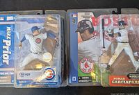 Front view of sealed Mark Prior and Nomar Garciaparra McFarlane MLB action figures