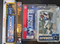 Front view of both packaged items showing contents and packaging fronts