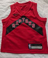 Front view showing graphics, swoosh, size tag