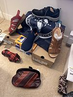 Group view of all shoes, purse, umbrellas