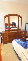 Full view of dresser with attached mirror
