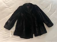 Front view of mink coat showing fur texture and collar