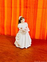 Front view of Royal Doulton Birthday Girl figurine