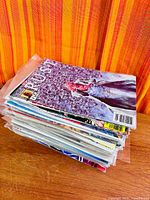 Stack of comics, top issue Trust visible
