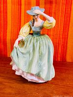 Front view of Royal Doulton Buttercup figurine
