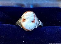 Front view of ring showing cameo profile and setting detail