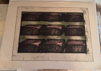 Full view of artwork on paper showing nine boxed forms and margins with inscriptions