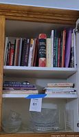 Cookbooks on upper shelf
