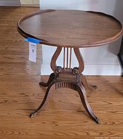 Full view of round lyre-base table
