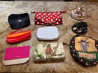 Overview of all nine pouches and bags on countertop
