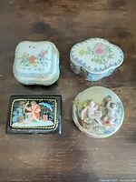 Group shot showing all four trinket boxes for scale and styles