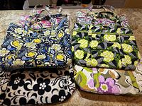 All six tote bags displayed flat showing assorted patterns