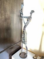 Front view of entire sculpture on base