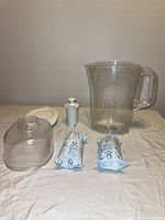 Pitcher body, lid, reservoir insert, two sealed filters, one unwrapped filter