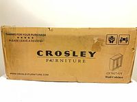Sealed shipping box labeled Crosley Furniture