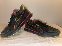 Side and top view of both shoes showing overall design and color scheme