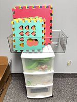 Overall lot with drawer cart, clear bin, foam mats