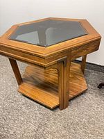 hexagonal wood side table with glass inset top and lower shelf