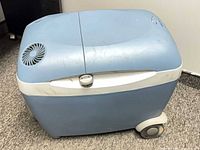 Closed cooler showing exterior, wheels, fan vent