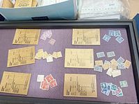 Tray with clusters of Austrian stamps and brown sorting cards