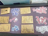 Overview of stamps sorted on payroll envelopes