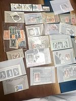 Overall view of glassine envelopes with assorted stamps