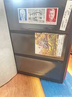 Open stockbook page showing Monaco 4.80 & 8.00 franc souvenir sheets and blank lower strips