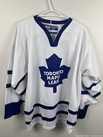 Front view showing logo, collar and striping