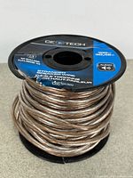 CE Tech 14-gauge speaker wire on spool showing label and remaining wire