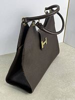 Full right side view showing shape, handles, hardware