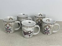 Group shot of all five matching country style coffee mugs