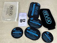 All items laid out showing five gel packs, sleeve, manual