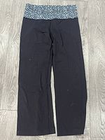 Full view of black wide-leg Lululemon pants