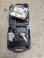 Porter-Cable nailer in case with nail tub