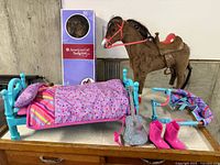 All items overview: doll box, bed, horse, accessories