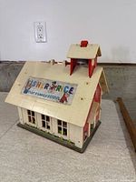 Front and left view of Fisher-Price schoolhouse exterior