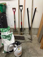 Overall lot with garden tools, fertilizer bags and HDX sprayer
